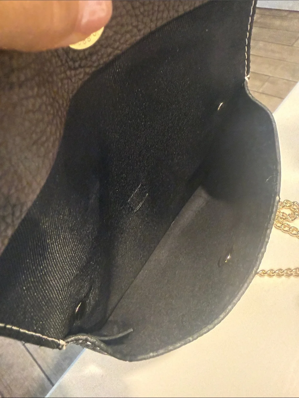 Black Pebbled Leather Crossbody Bag with Speckled Tab and Gold Chain